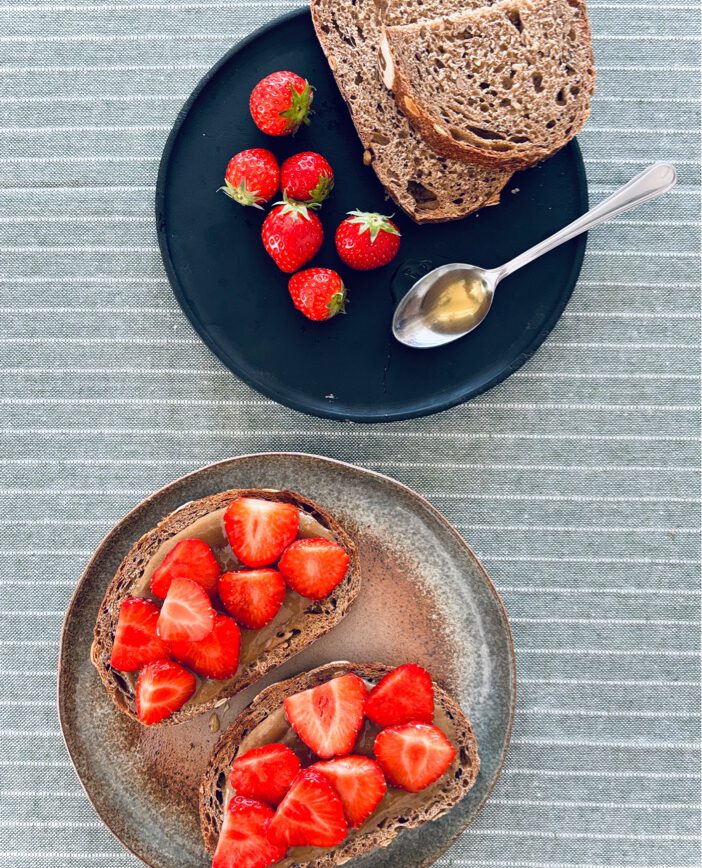 Tahini , honey + strawberries on toast