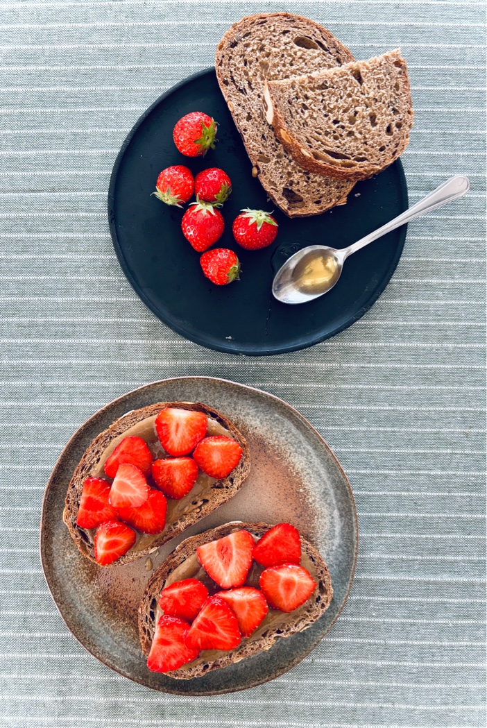 Tahini , honey + strawberries on toast