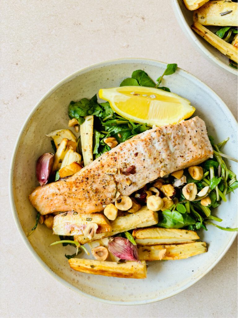 traybake with salmon parsnips and hazelnut